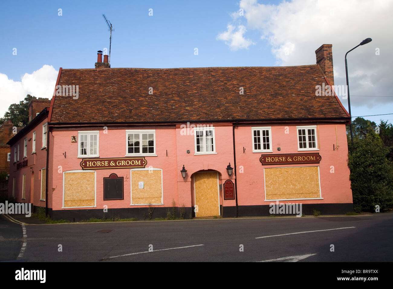 Closed down boarded up village pub, Horse and Groom, Melton, Suffolk