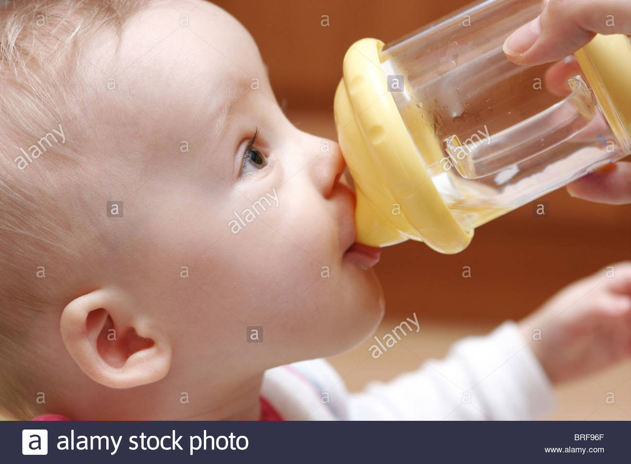 Toddler, baby gets a baby bottle Stock Photo, Royalty Free Image 31683975 Alamy