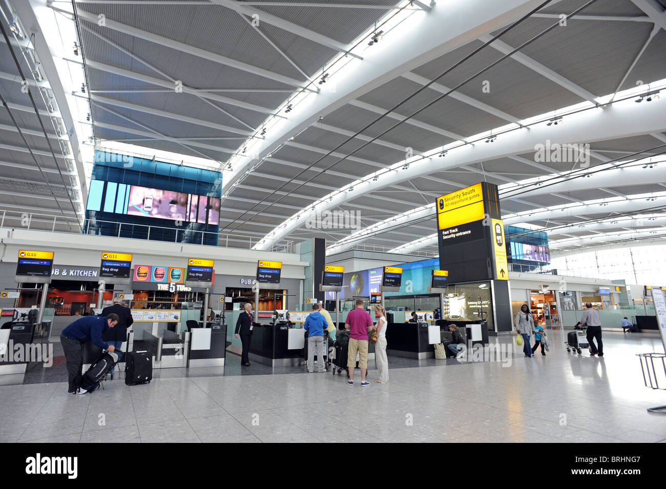 One of the check in areas inside Heathrow terminal 5 Stock Photo, Royalty Free Image 31737559