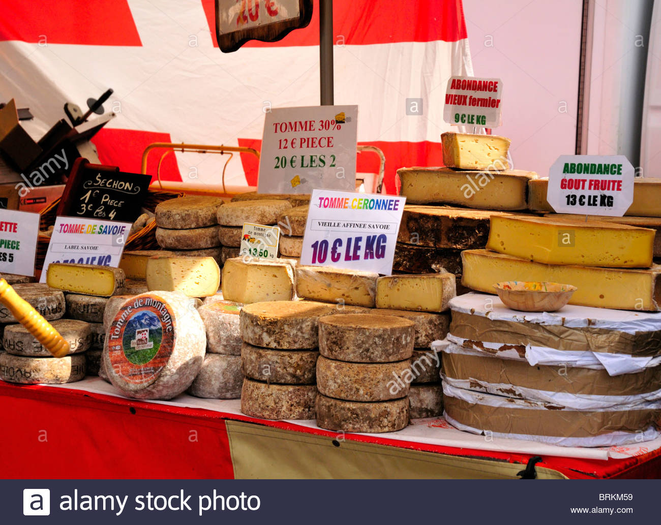 a cheese stall in a french open air outdoor market Stock Photo, Royalty