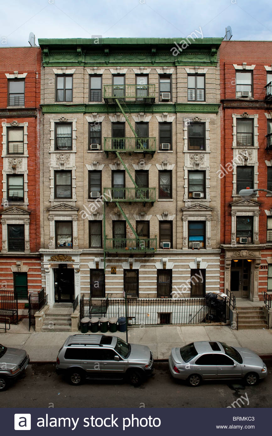 Apartment Building Front front view of old harlem tenement building stock photo, royalty Apartment Building Front front view of old harlem tenement building stock photo, royalty