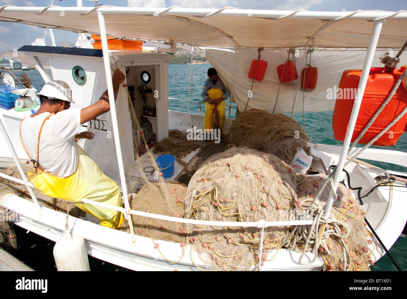 Fishermen Repair Their Nets Hi Res Stock Photography And Images Alamy