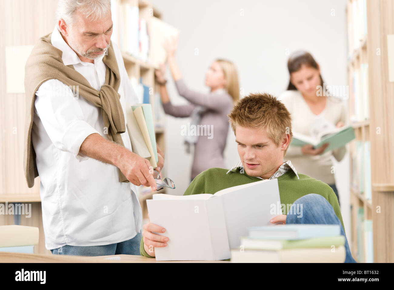 Mature professor with student