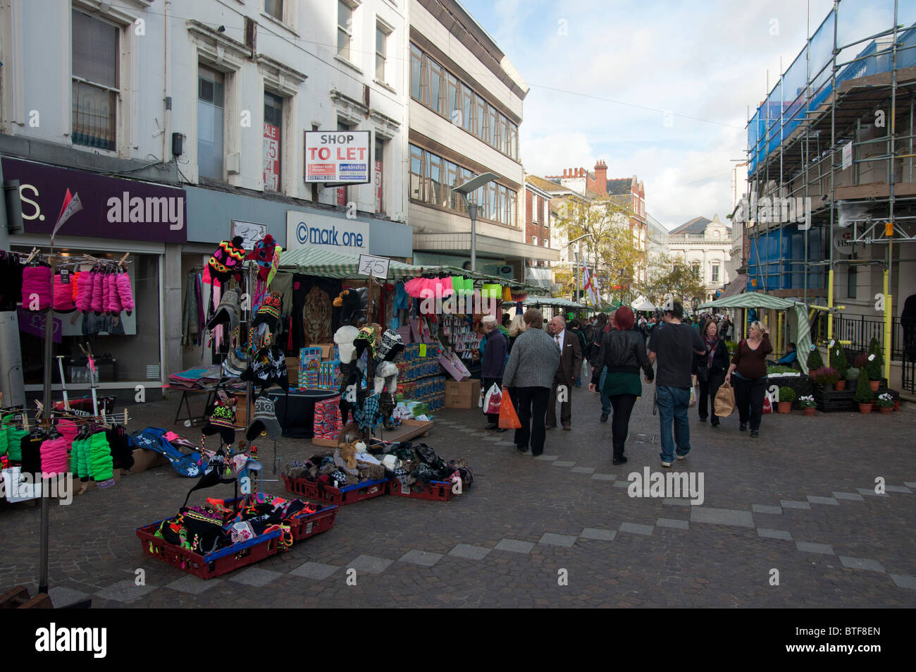 shops and market stall centre of Folkestone town kent england UK Stock