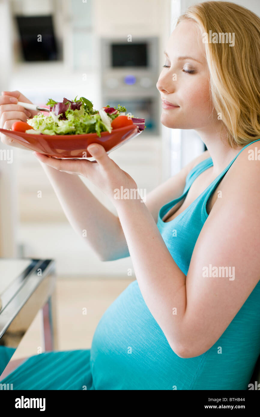 pregnant woman eating salad Stock Photo, Royalty Free Image 32344036 Alamy