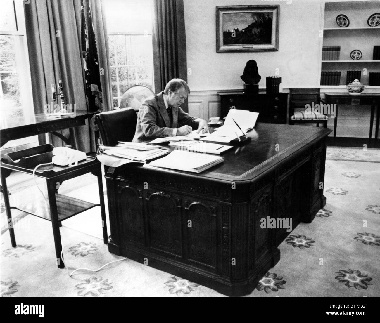 President Jimmy Carter at work in the Oval Office of the White House