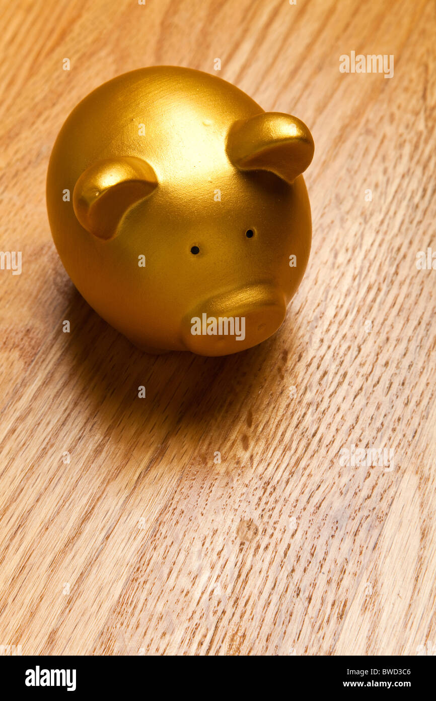 Gold Piggy Bank On Wood Table Top Stock Photo Royalty Free Image - Gold Piggy Bank On Wood Table Top gold piggy bank on wood table top stock photo royalty free image - gold piggy bank on wood table top