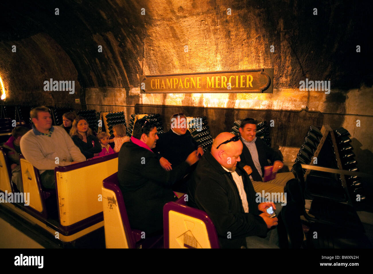 Tourists on the train in the cellars of the Mercier Champagne House