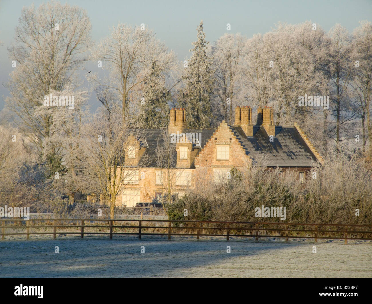 A country house in Barton Bendish Norfolk surrounded by frost covered