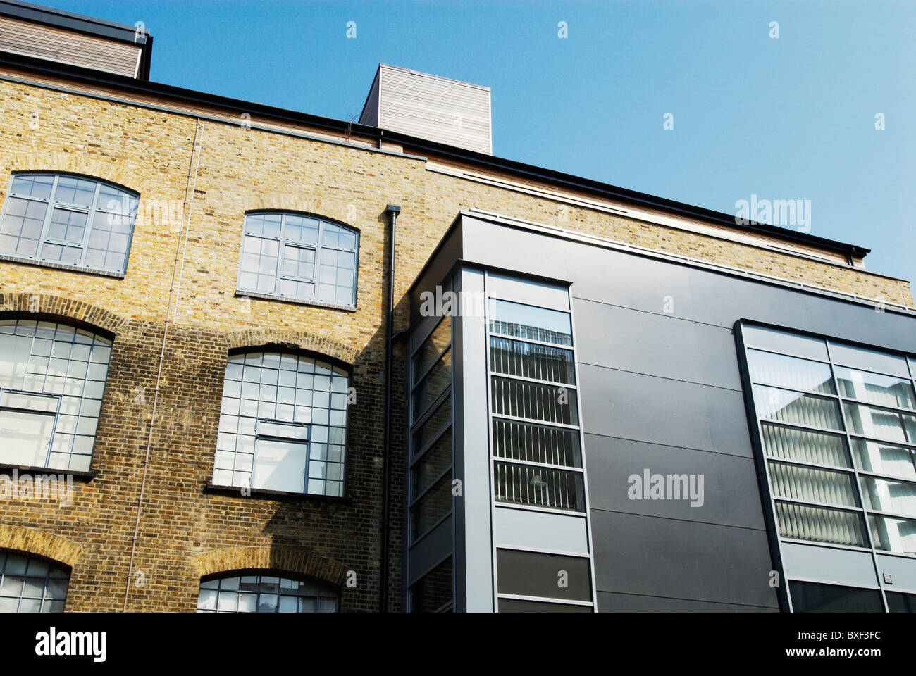 Modern office roof extension to converted factory building The Stock