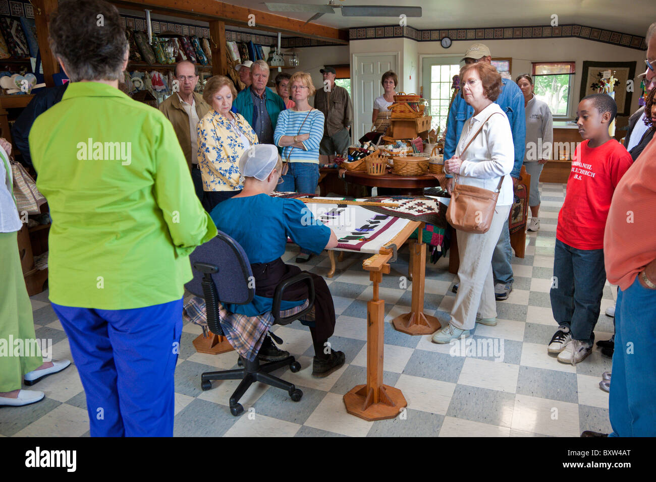 Amish Woman Gives Quilting Demonstration For Tourists In Lancaster