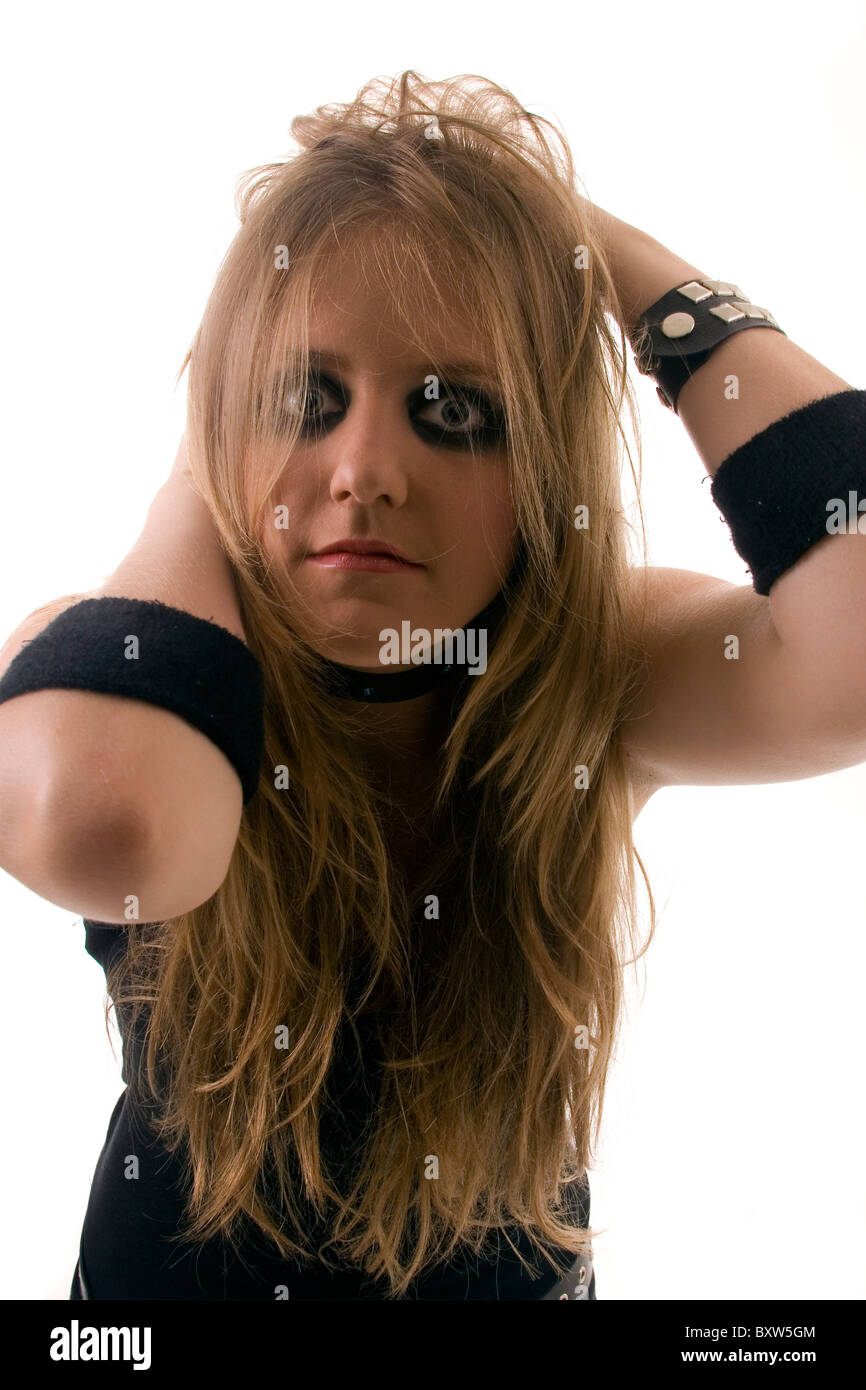 A <b>crazy</b> looking <b>rock</b> chic with smudged black eye shadow and matching arm <b>...</b> - a-crazy-looking-rock-chic-with-smudged-black-eye-shadow-and-matching-BXW5GM