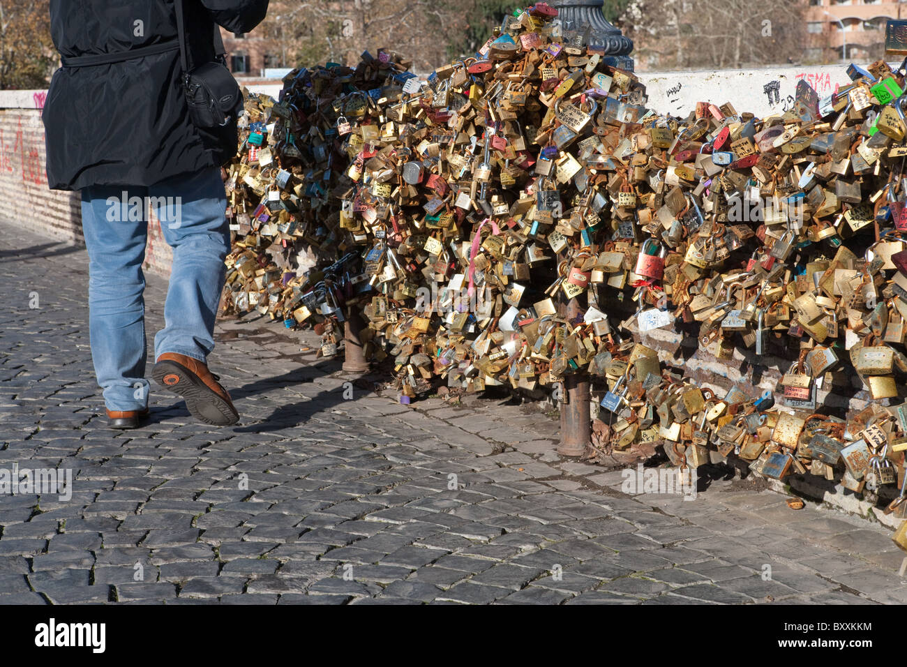 First love lock locks on the Milvio bridge chained to wall Rome Italy
