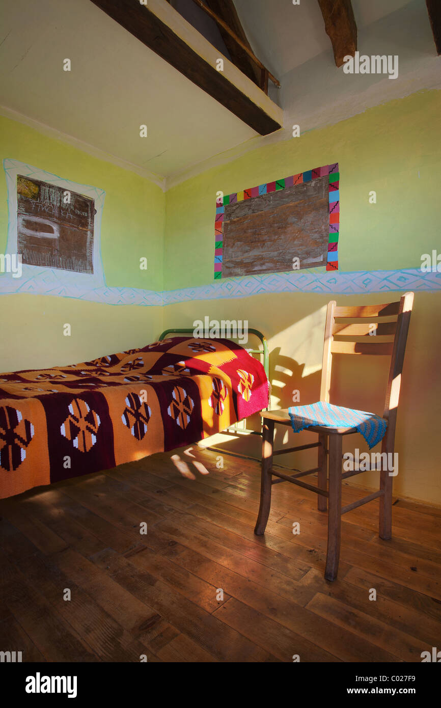 Old Wooden House Interior Empty Room With Bed And Chair Old Wooden House Interior Empty Room With Bed And Chair