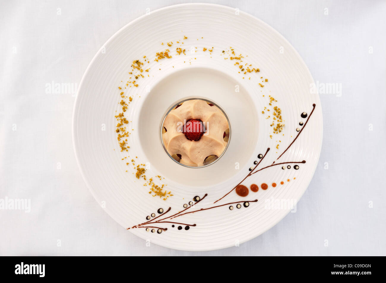 Dessert, latte macchiato mousse on a decorated plate, haute ...