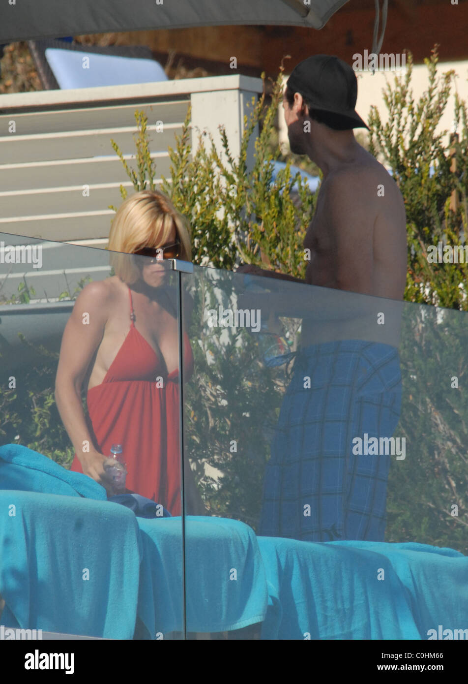 Jenny McCarthy And Jim Carrey Sunbathing At Their Beach House In Malibu