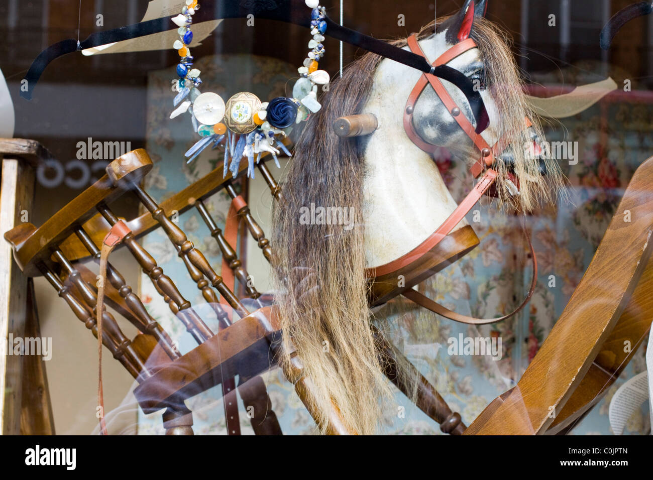 Old Fashioned Rocking Horse In A Toy Shop Window Old Fashioned Rocking Horse In A Toy Shop Window