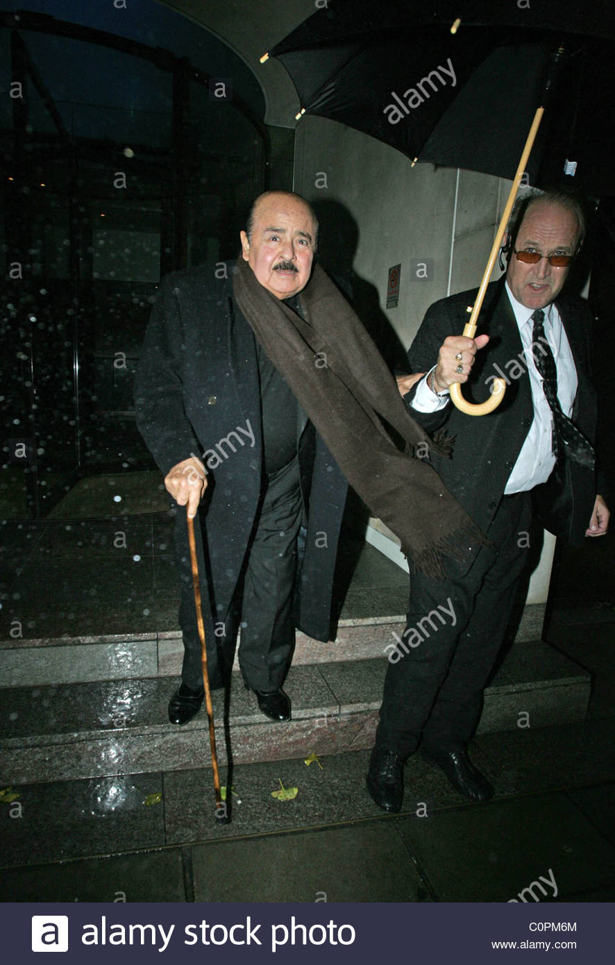 Adnan Khashoggi, ex billionaire arms dealer, leaving Nobu London Stock