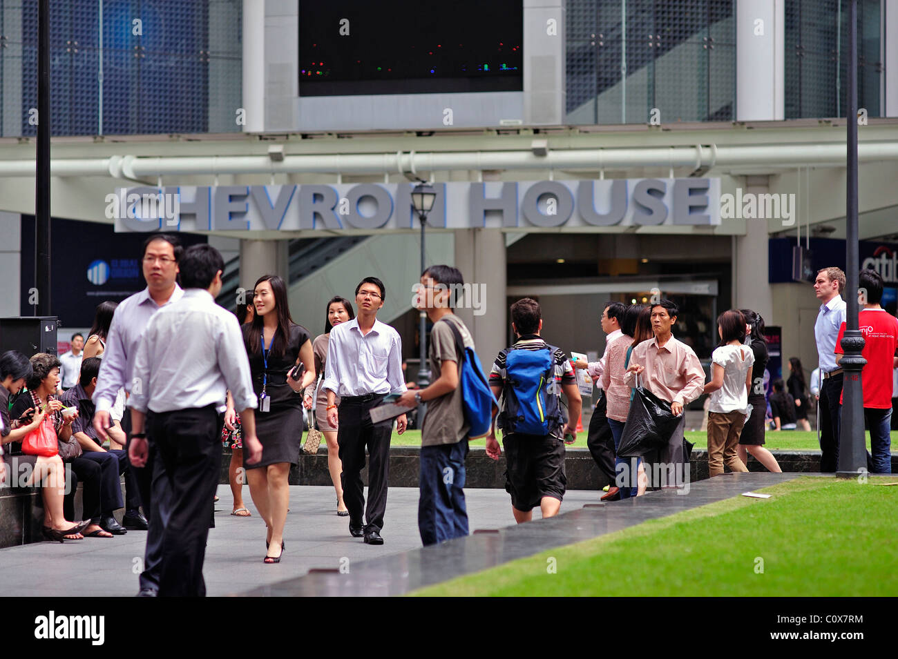 Raffles Place Business District People Outside at Lunch Time Stock