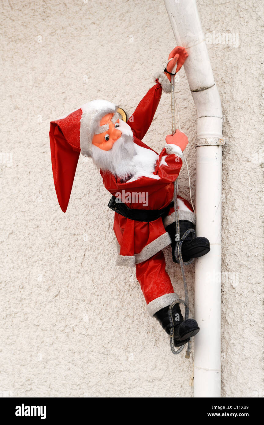 santa claus figure climbing gutter stock photo royalty santa claus figure climbing gutter stock photo royalty