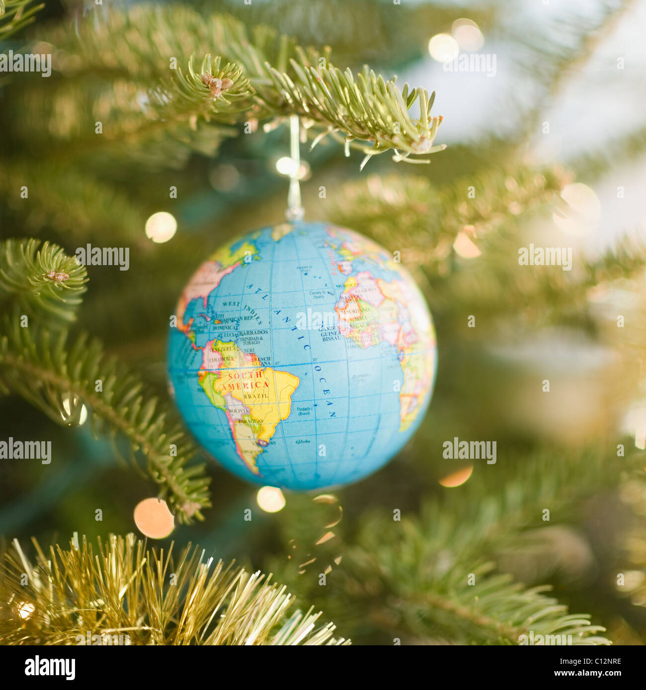 USA, New Jersey, Jersey City, Globe bauble on Christmas tree Stock Photo, Royalty Free Image