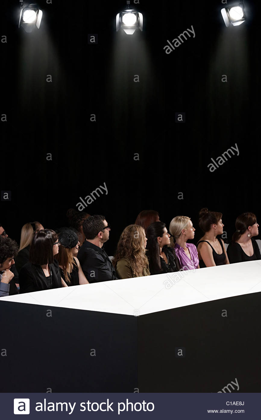 Audience At Fashion Show Watching Empty Catwalk Audience At Fashion Show Watching Empty Catwalk