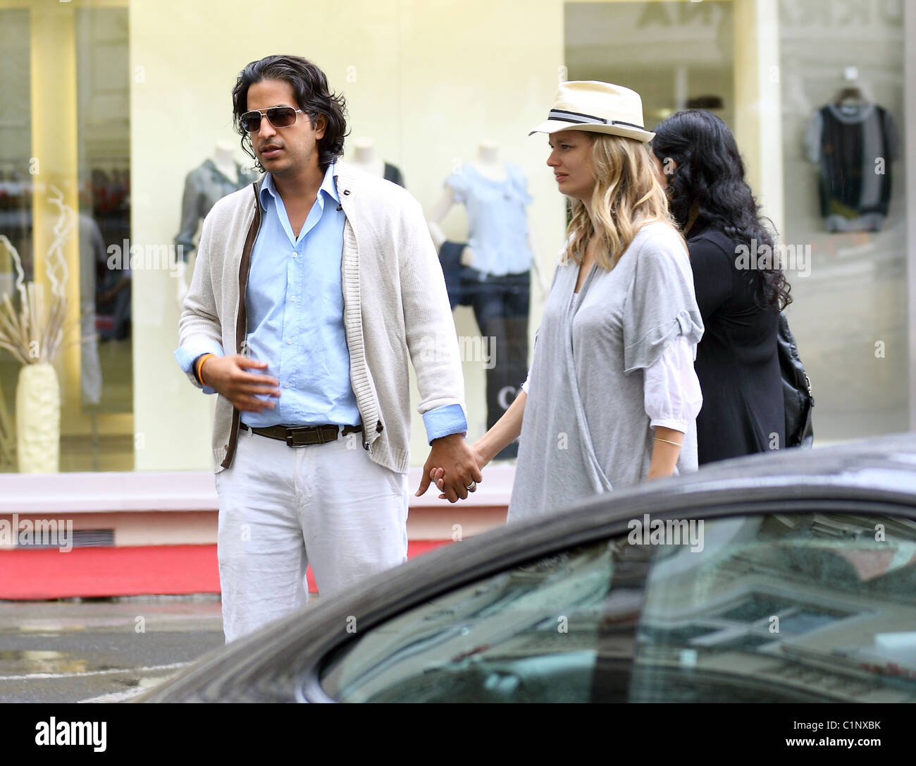 Model Helena Houdova and husband Omar Amanat take a walk through the