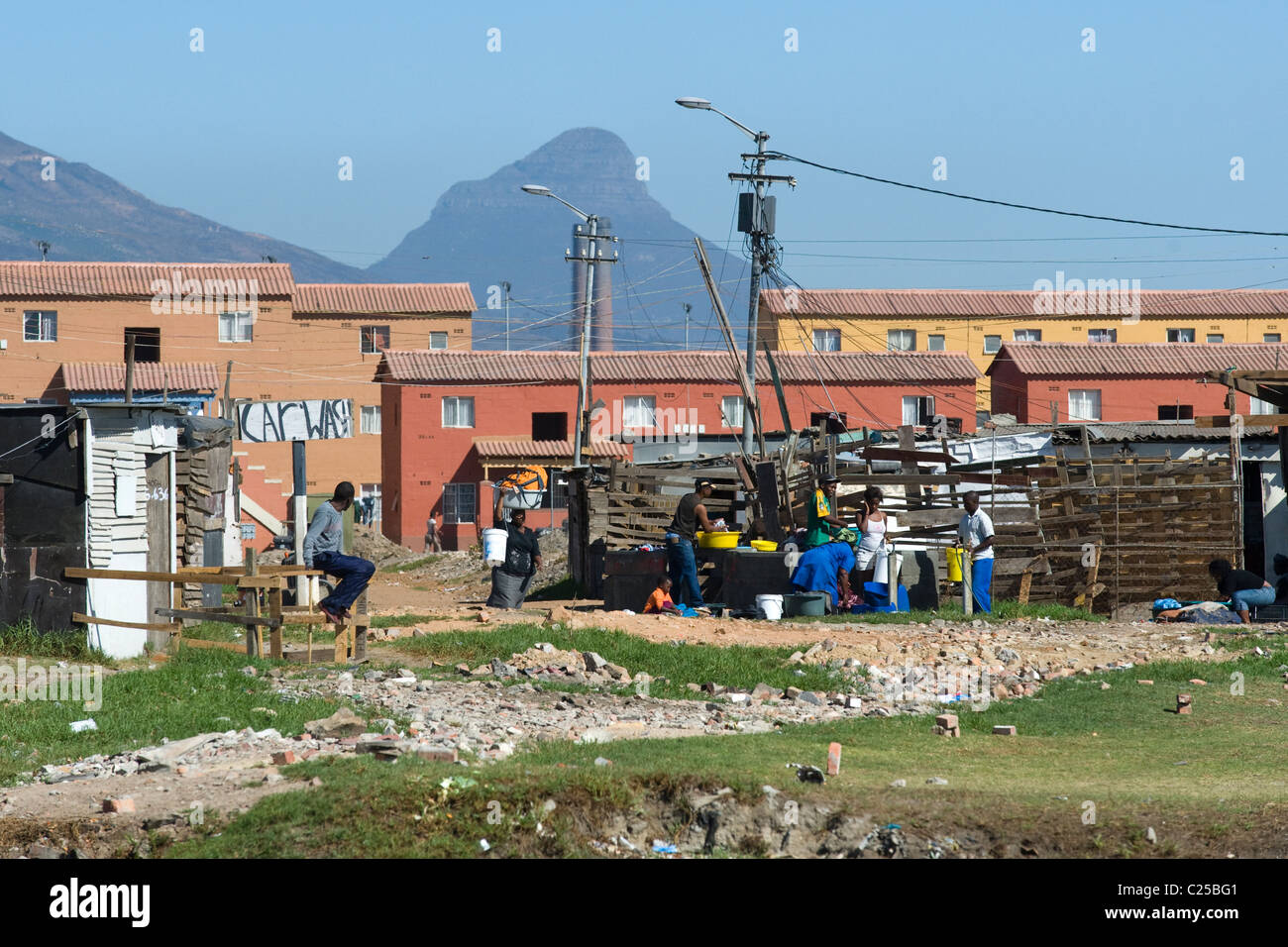 Shacks and new housing along Vanguard Drive, Epping, Cape Town, South