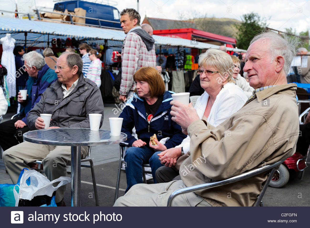 People at Abergavenny open air market, Wales, UK. Shoppers at an Stock