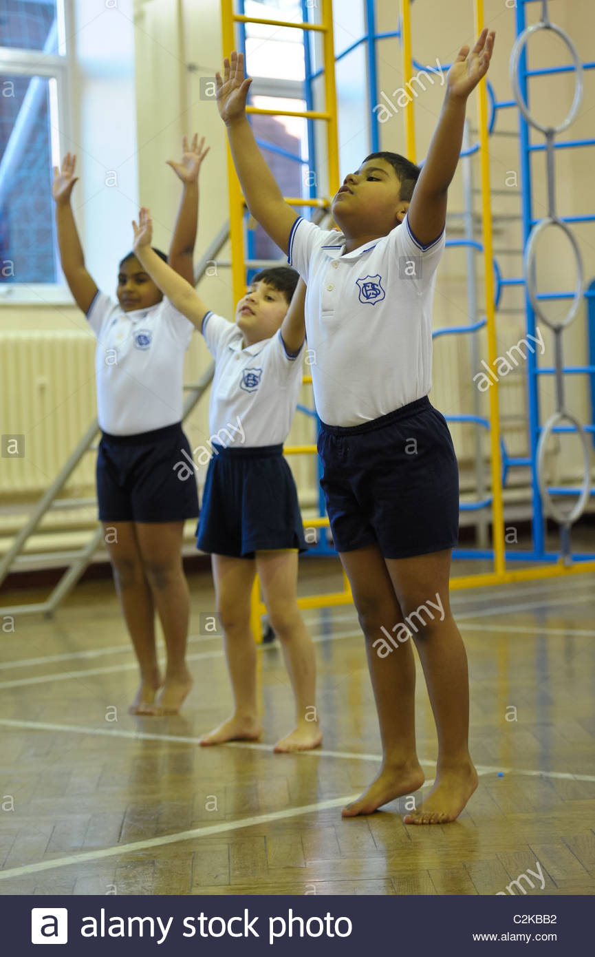Primary School pupils take part in PE lessons Stock Photo, Royalty Free ...