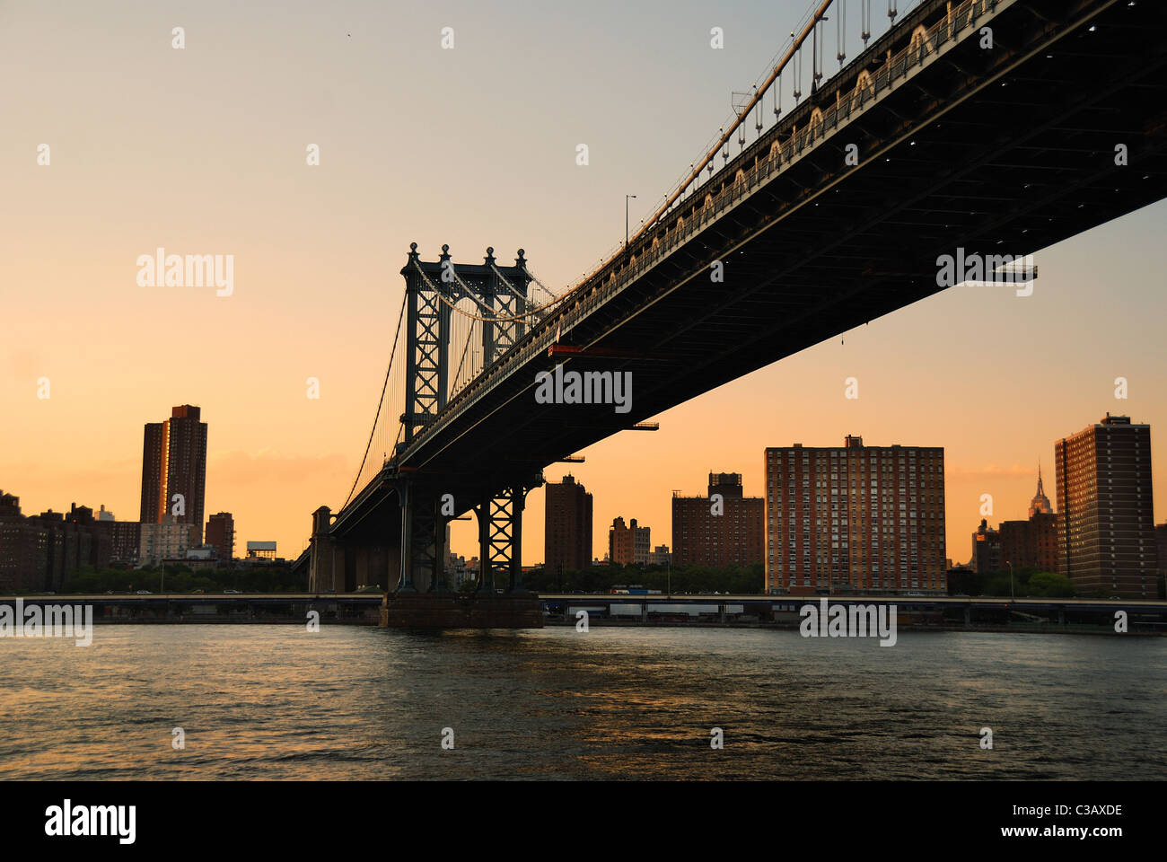 New York City Manhattan Bridge Over Hudson River With Skyline After