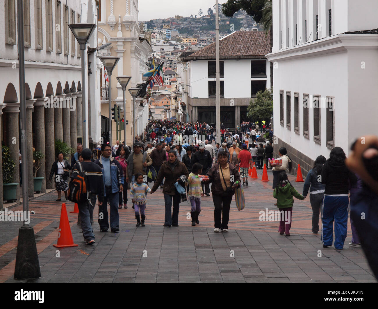 Local people walking in the streets in the city centre of Quito Stock