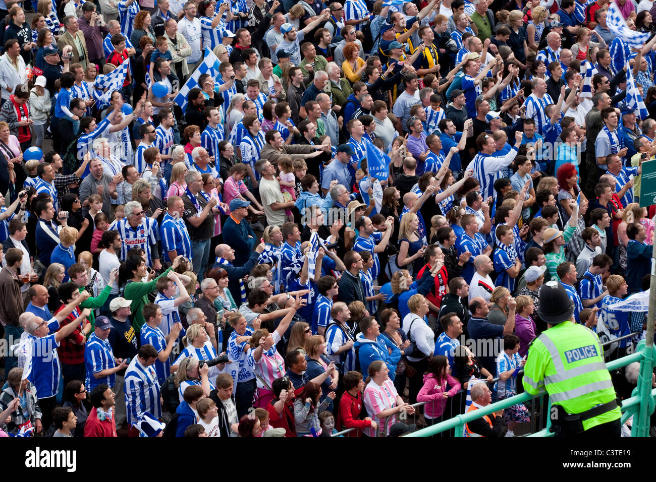 brighton-and-hove-albion-football-supporters-cheer-the-team-during-C3TE19.jpg