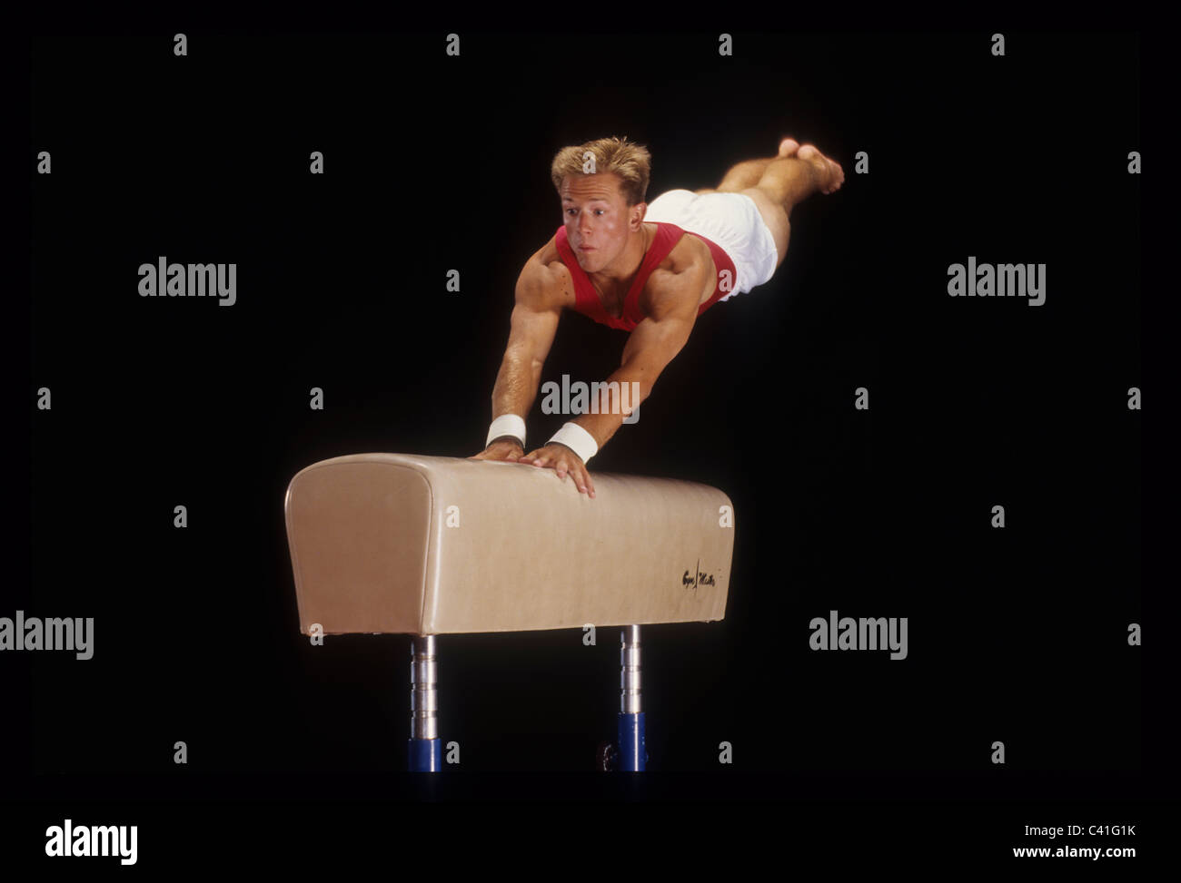 Male gymnast on the vault stock photo royalty free image 36913903  alamy