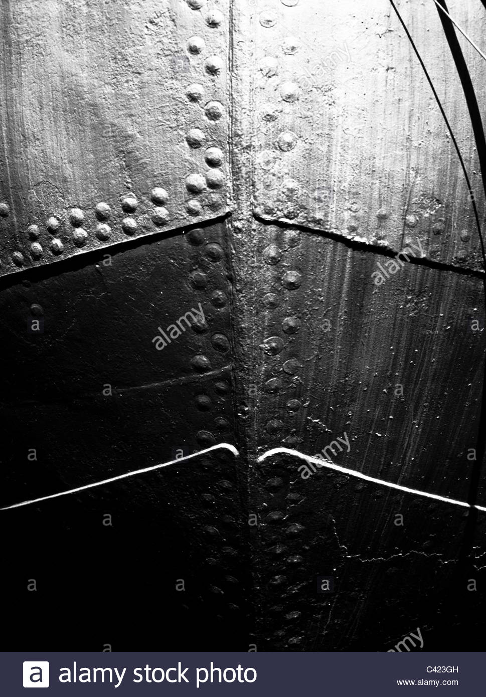 Riveted ship hull, with the rivets clearly visible Stock Photo, Royalty