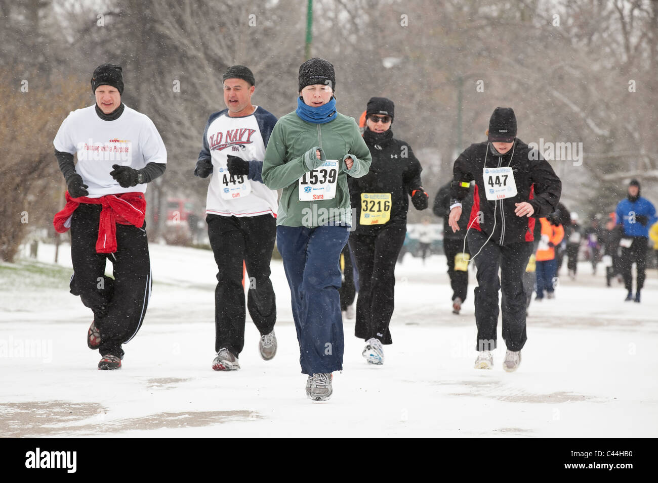Marathon runners on a cold snowy day. Winnipeg, Manitoba, Canada Stock