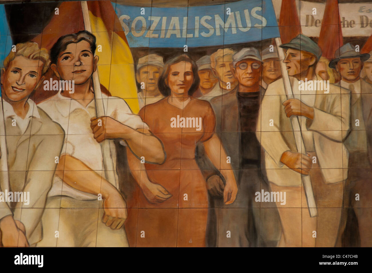 Socialist realist mural on a building in Berlin, Germany depicting