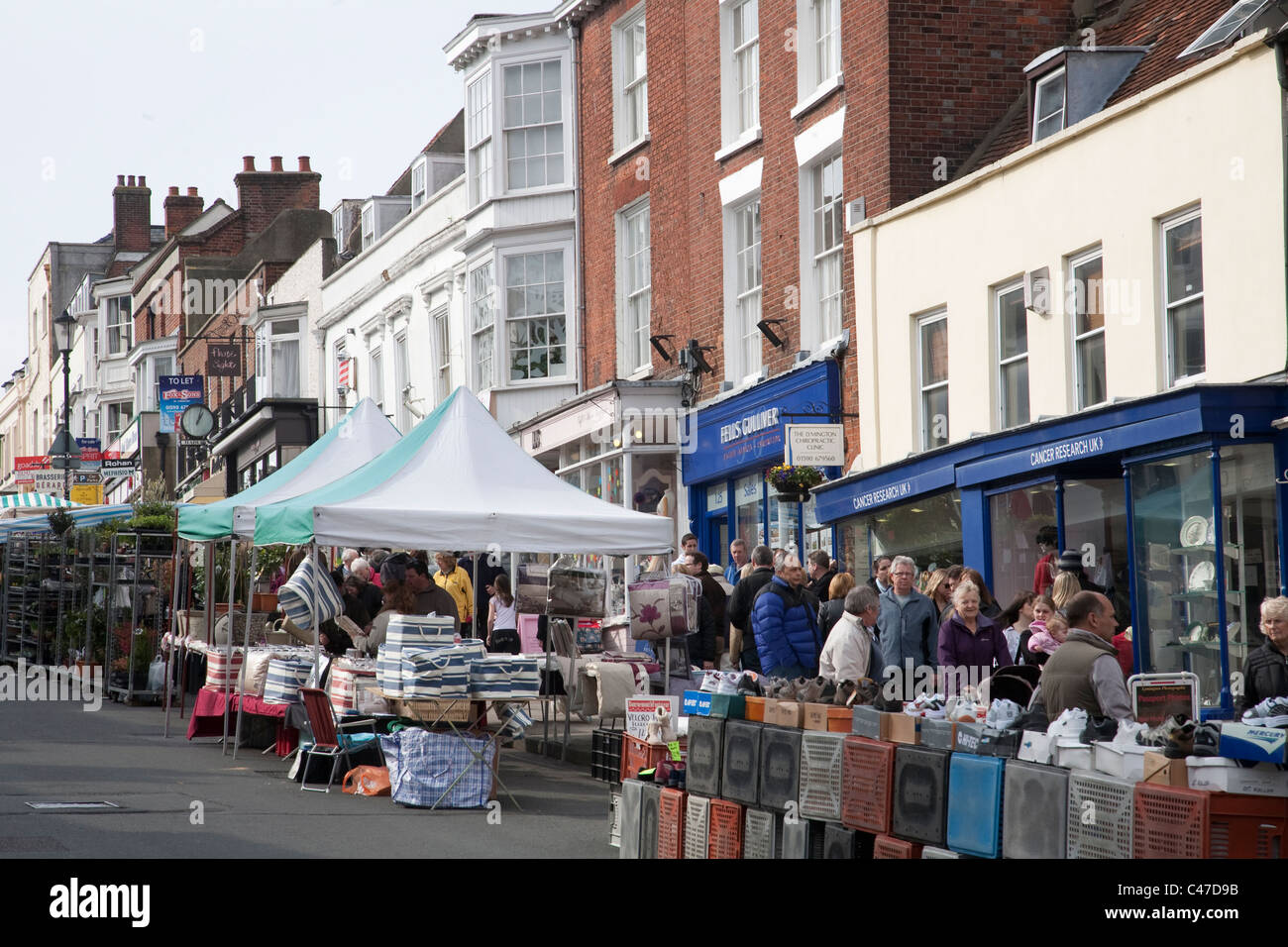 Market stalls on Lymington High Street, Hampshire, England Stock Photo