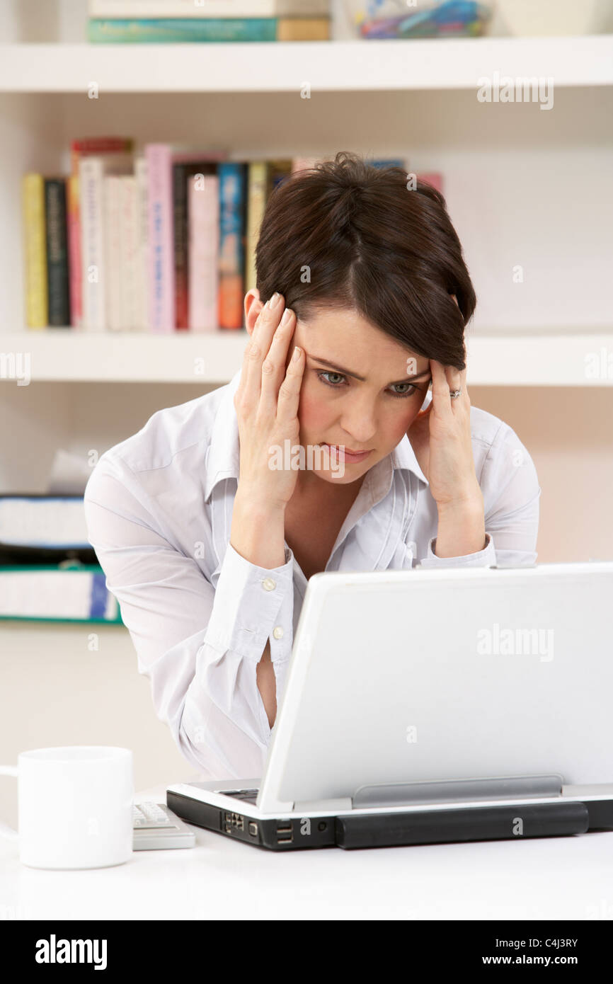 worried-looking-woman-working-from-home-