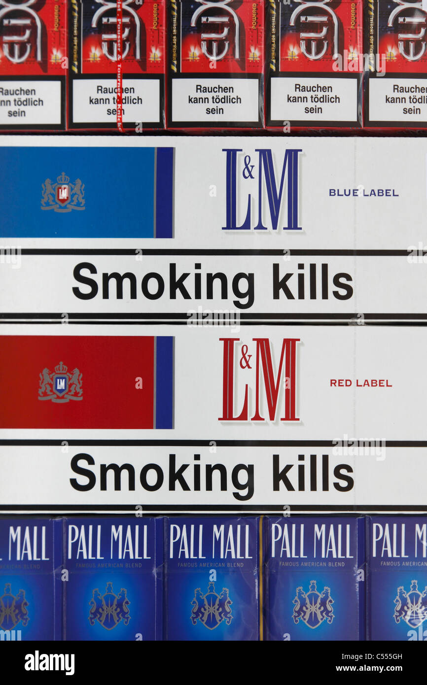 warning 'smoking kills' on cigarette packs Stock Photo, Royalty Free