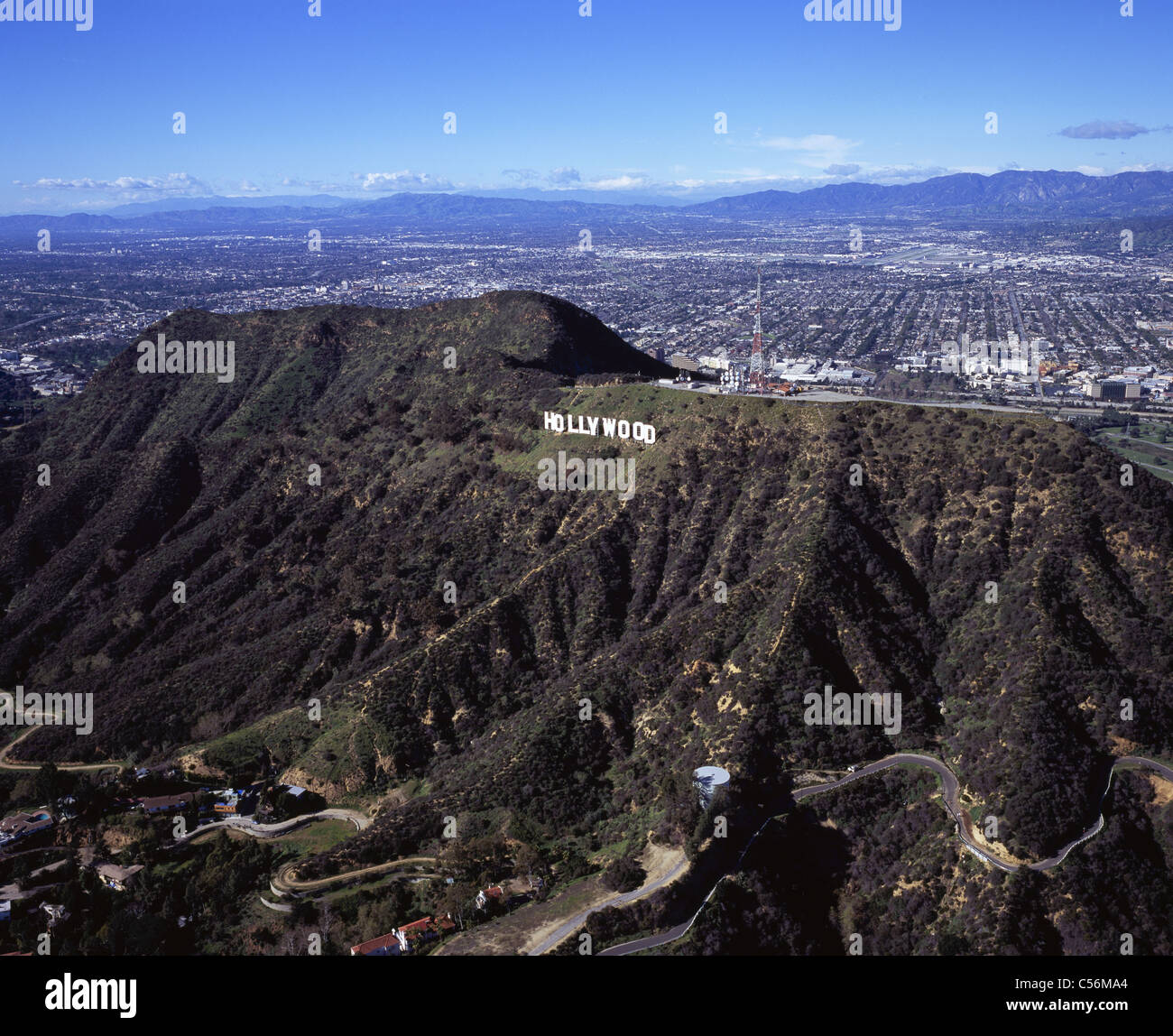 HOLLYWOOD SIGN (aerial view). City of Burbank behind the sign Stock