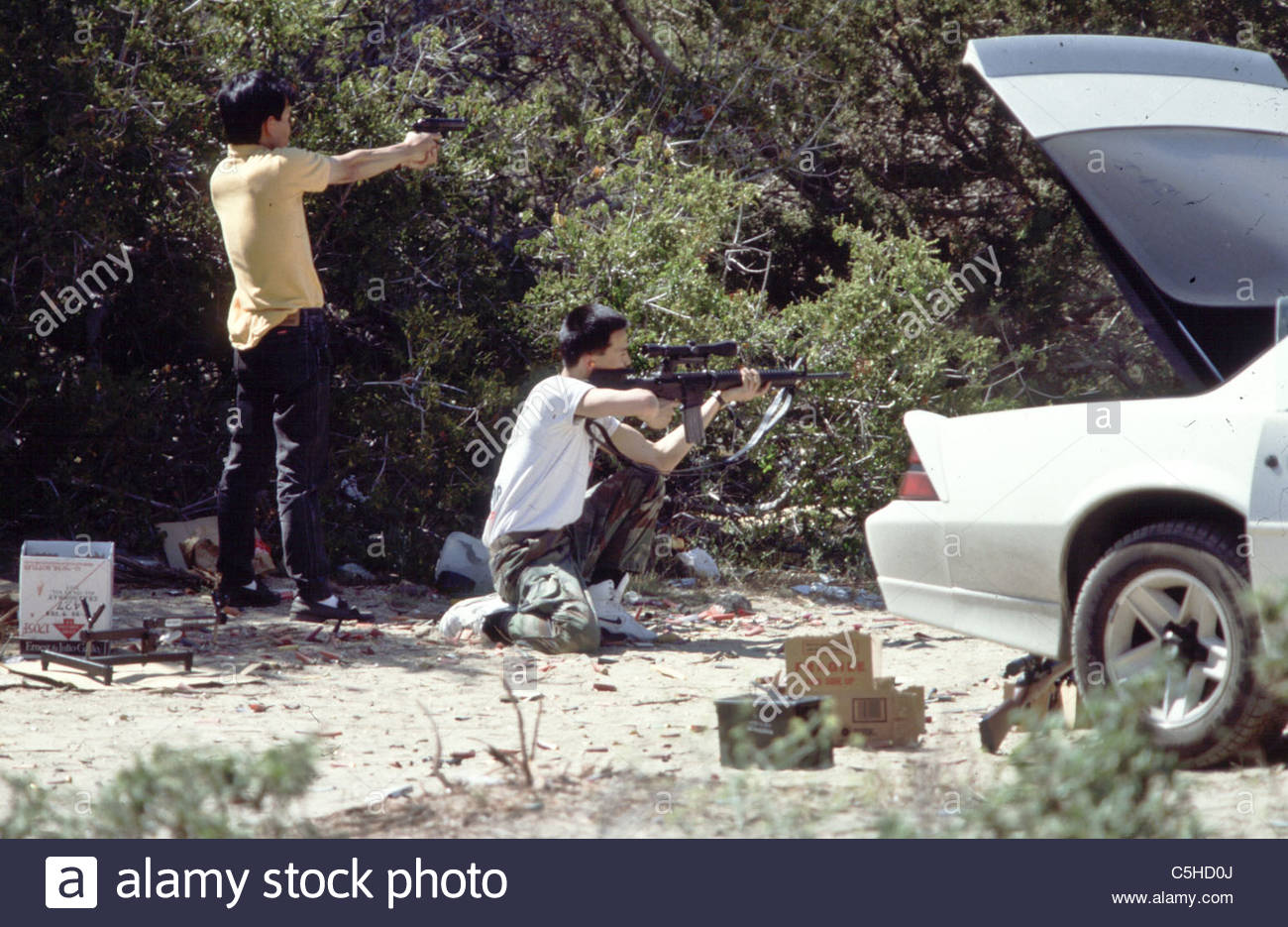 Guns Shooting People People Shooting Guns in The
