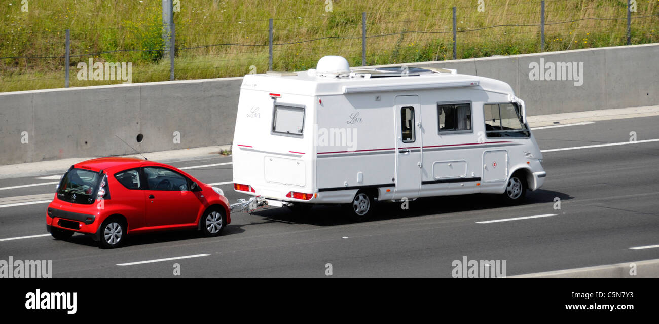Camper van towing car Stock Photo, Royalty Free Image 37961255 Alamy