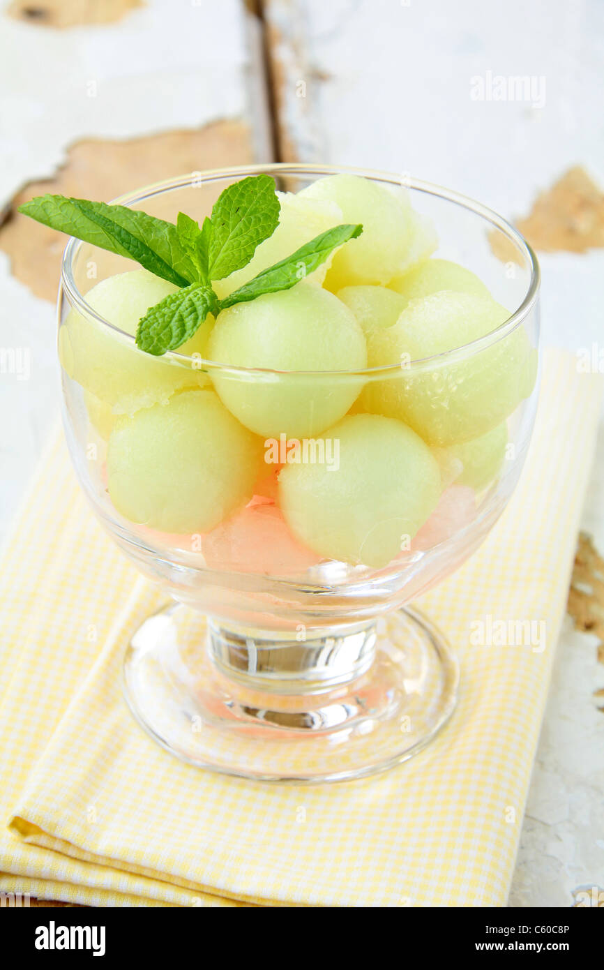 Fruit Salad With Melon And Watermelon Balls In Glass Bowl Stock Photo