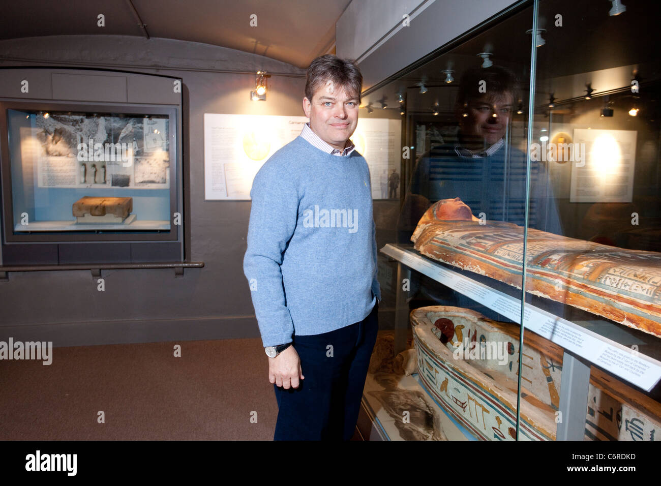 Lord Carnarvon at the Egyptian Exhibition inside Highclere Castle Stock Photo, Royalty Free