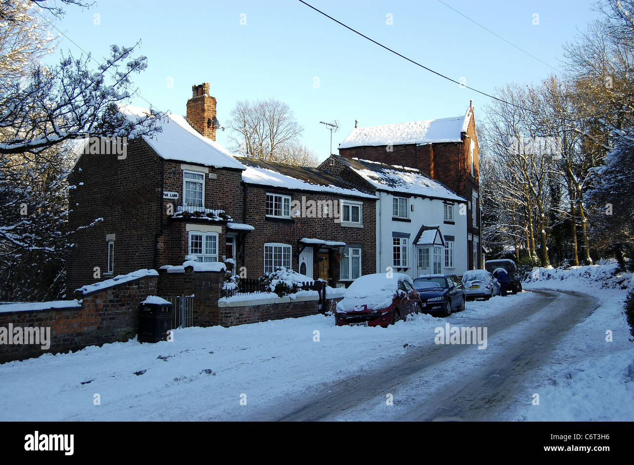 The snowfall of August 2010 showing cottages on Far Lane, Gorton in
