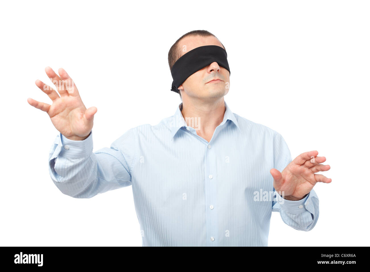 businessman-blindfolded-stretching-his-a
