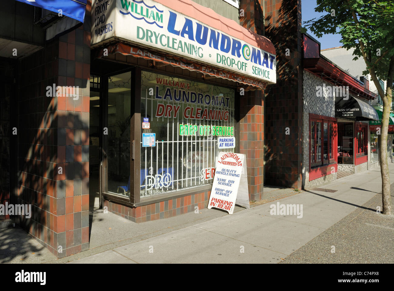 Public laundromat located on Commercial Drive, in the City of Stock Photo, Royalty Free Image