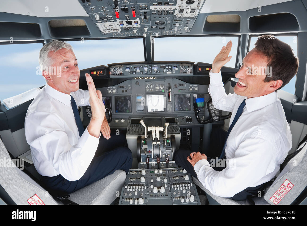 Germany, Bavaria, Munich, Pilot and copilot piloting aeroplane from