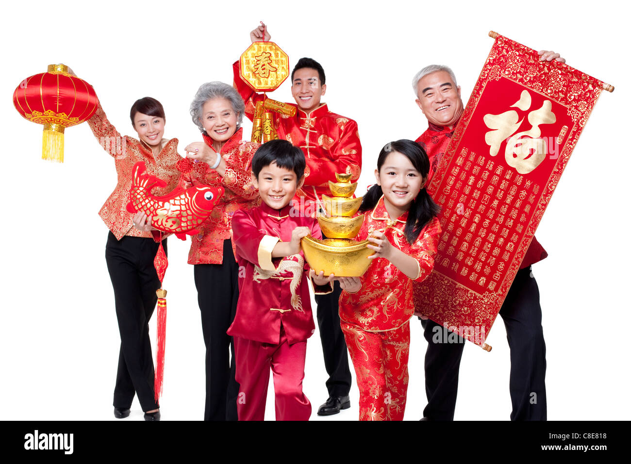 Family Dressed in Traditional Clothing Celebrating Chinese New Year Stock Photo ...